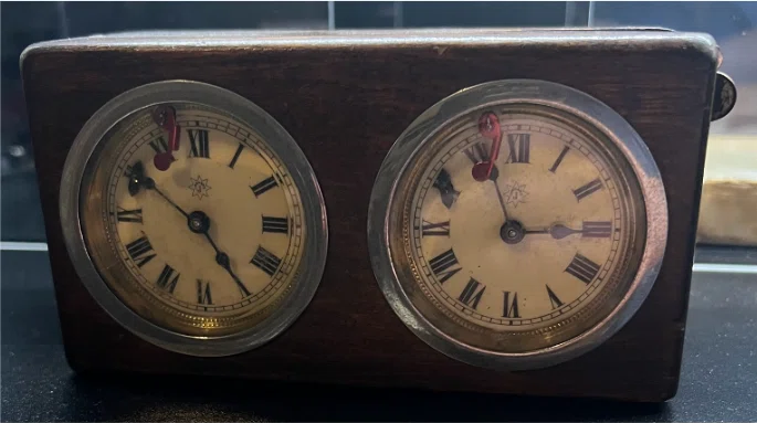 Front and Rear Views: Paired-Movements in a Wooden Case