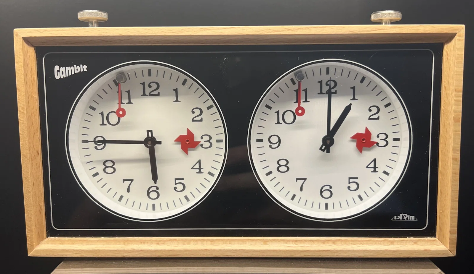 PRIM Gambit chess clock in a natural wooden case