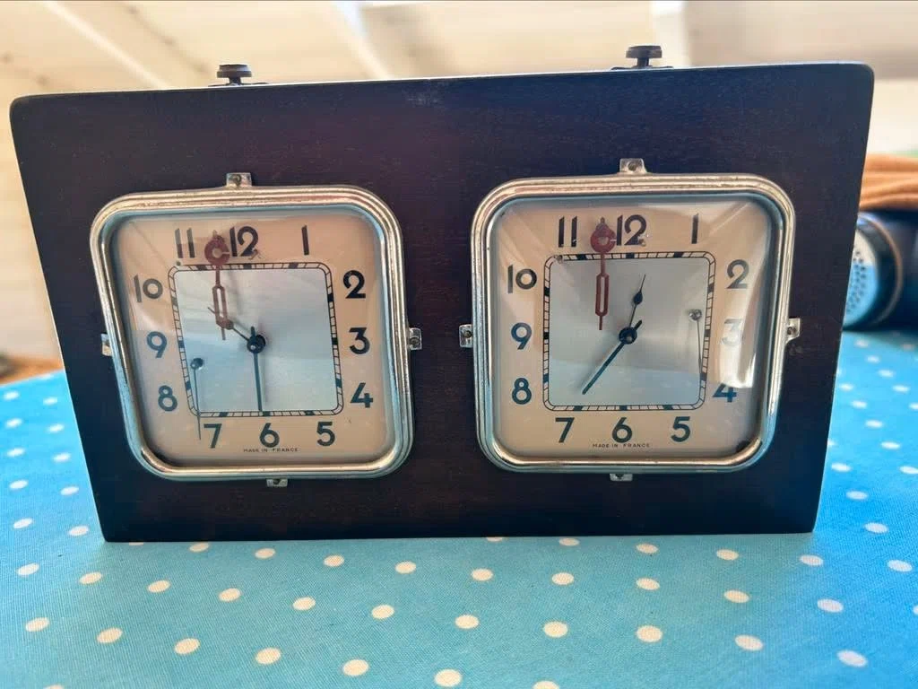 Unidentified French pre-war chess clock: square “Made in France” alarm-clock units in a dark wooden case