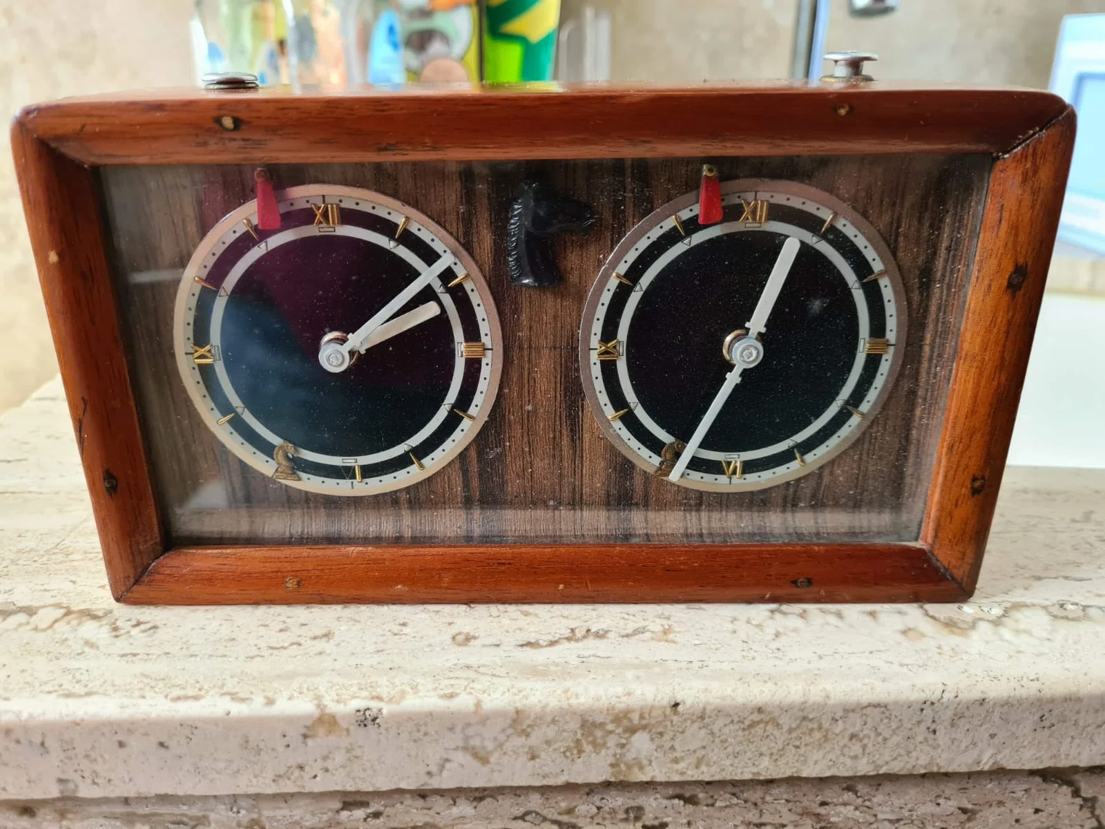 Surviving dark-dial wooden chess clock made by Carlos Sobrino.
